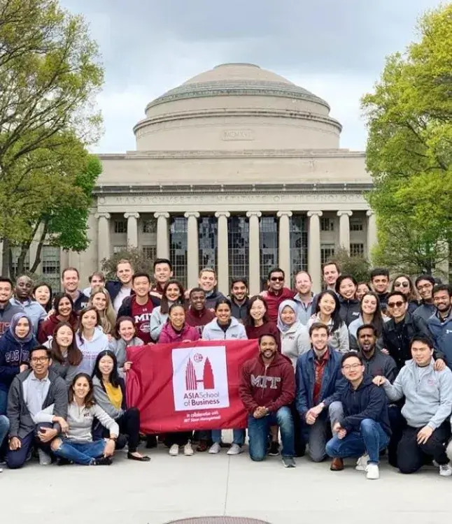 Asian School of Business student taking group photo in front of MIT, Massachusetts Institute of Technology